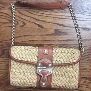 Michael Kors straw clutch with strap